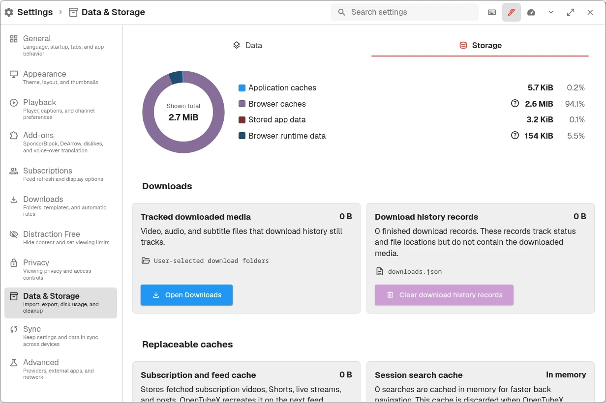 Storage tab with a disk-usage chart and separate cards for downloaded media, download history records, and replaceable caches.